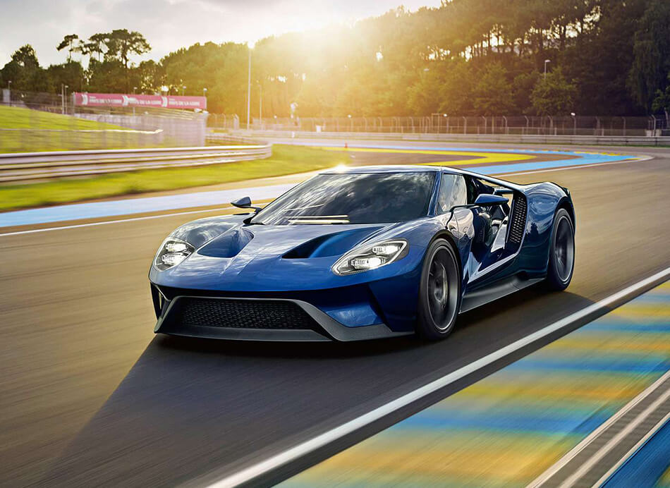 Front and side view of super car on a race track