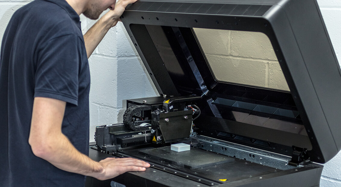 Man using laser cutter